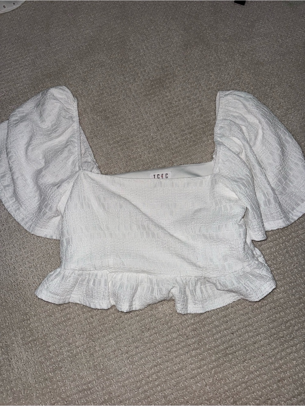 TCEC White Puff Sleeve Ruffle Hem Crop Top